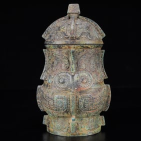 An Archaic Bronze Beast-Face Pattern Cover Jar