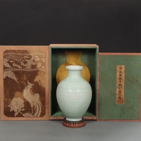 An Exquisite Celadon Glazed Ruyi Pattern Vase