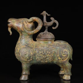 An Archaic Bronze Dragon Pattern Sheep Pot
