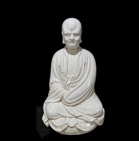 A Solemn Blance-De-Chine Statue of Dharma