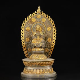An Exquisite Gilt Silver Statue of Sakyamuni