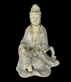 A Solemn Blance-De-Chine Statue of Avalokitesvara