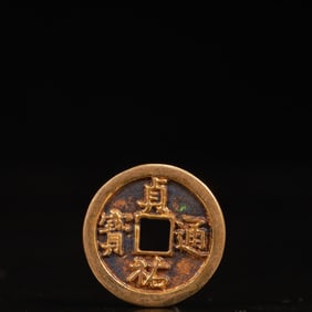 An Archaic Gilt Bronze Cash