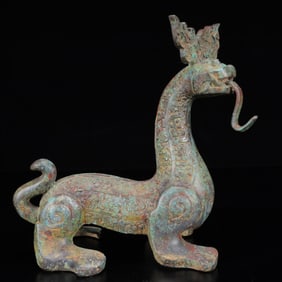 An Archaic Bronze Dragon Ornament