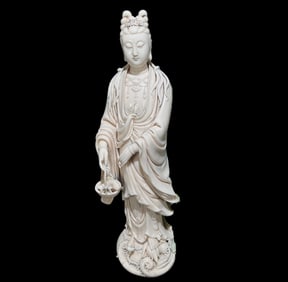 A Solemn Blance-De-Chine Statue of Avalokitesvara