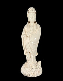 A Solemn Blance-De-Chine Statue of Avalokitesvara