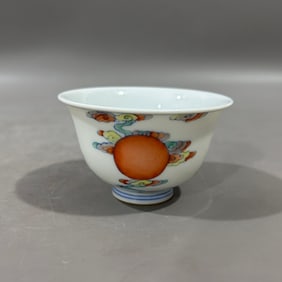 An Exquisite Doucai Auspicious Cloud and Sun Pattern Cup