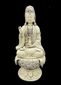 A Solemn Blance-De-Chine Statue of Avalokitesvara