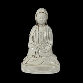 A Solemn Blance-De-Chine Statue of Avalokitesvara