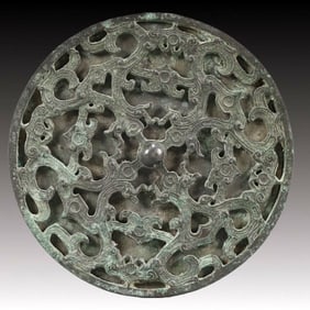 An Archaic Bronze Mirror