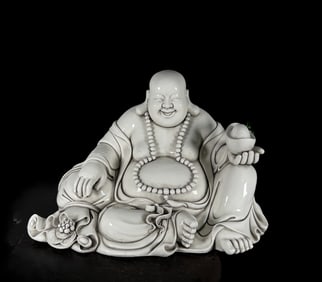 A Solemn Blance-De-Chine Statue of Maitreya Buddha