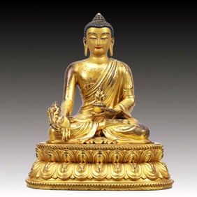 A Solemn Gilt Bronze Statue of Sakyamuni