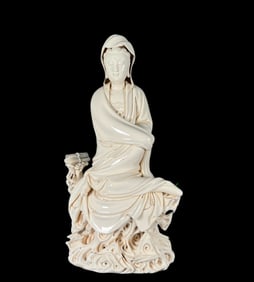 A Solemn Blance-De-Chine Statue of Avalokitesvara