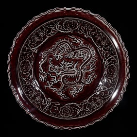 A Rare Ji Red Glazed Flower and Dragon Pattern Plate