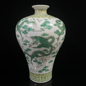 A Rare Celadon Glazed Auspicious Cloud and Dragon Pattern Vase