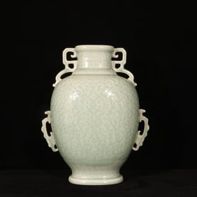 An Exquisite Celadon Glazed Lotus and Eight Treasures Pattern Double-Ears Vase