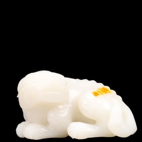 An Exquisite White Jade Lion Ornament