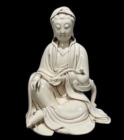 A Solemn Blance-De-Chine Statue of Avalokitesvara