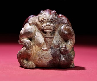 An Exquisite Gaogu Jade Bear Hand Piece