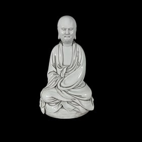 A Solemn Blance-De-Chine Statue of Dharma