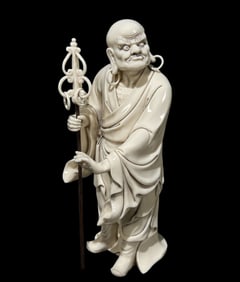 A Solemn Blance-De-Chine Statue of Arhat