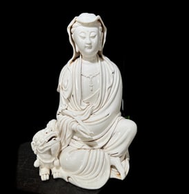 A Solemn Blance-De-Chine Statue of Avalokitesvara