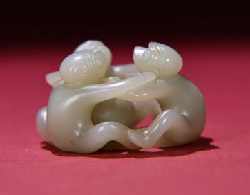 An Exquisite White Jade Monkey Ornament