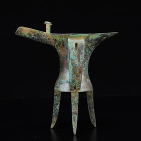 An Archaic Bronze Tripod Libation Cup