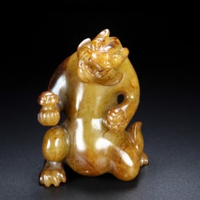 An Archaic Gaogu yu Auspicious Beast Ornament