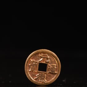 An Archaic Gilt Bronze Cash