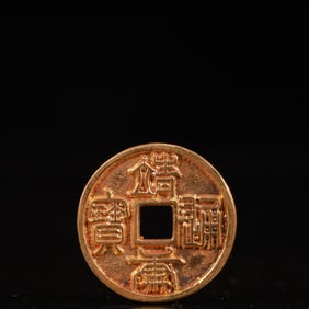 An Archaic Gilt Bronze Cash
