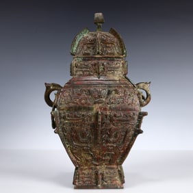 A Rare Bronze Beast-Face Pattern Double-Ears Bottle