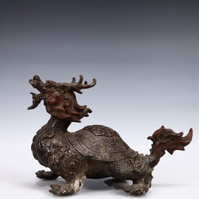A Solemn Gilt Bronze Dragon and Turtle Ornament