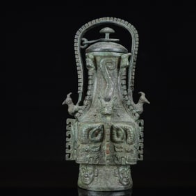 An Archaic Bronze Auspicious Beast Pattern Phoenix-Ears Ewer,with Inscription
