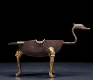 An Exquisite Silver Phoenix Head Tripod Cup