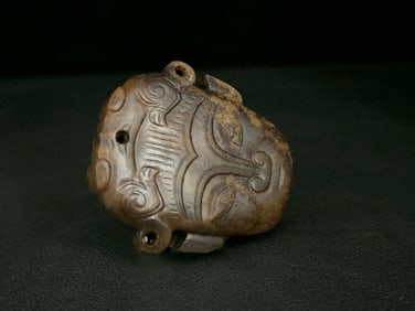 An Exquisite White Jade Beast-Face Pattern Ornament