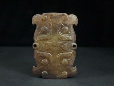 An Exquisite White Jade Beast-Face Pattern Ornament