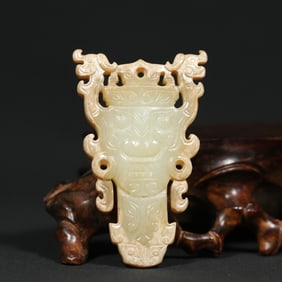 An Exquisite White Jade Beast-Face Pattern Pendant