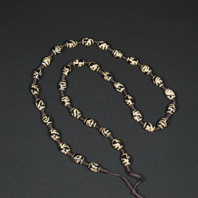 An Exquisite Agate Dzi Bead Pendant