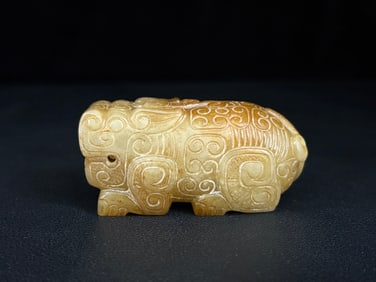 An Exquisite White Jade Auspicious Beast Ornament