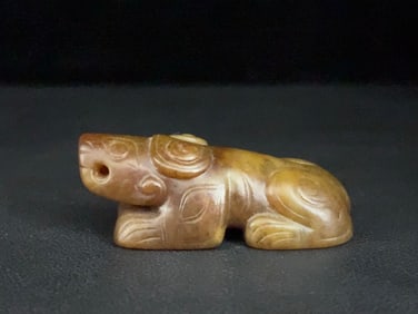 An Exquisite White Jade Auspicious Beast Ornament