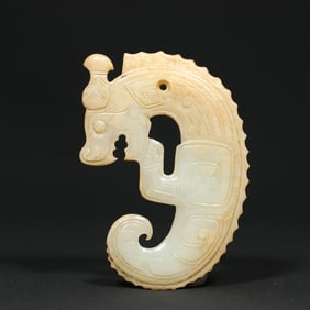 An Exquisite White Jade Dragon Pendant
