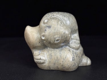 An Exquisite White Jade Bear Ornament