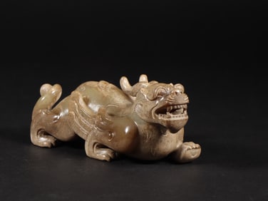 An Exquisite White Jade Auspicious Beast Ornament