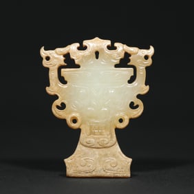 An Exquisite White Jade Beast-Face Pattern Ornament