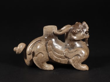 An Exquisite White Jade Auspicious Beast Ornament