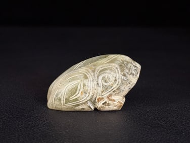 An Exquisite White Jade Auspicious Beast Ornament