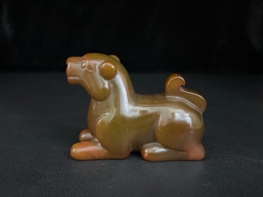 An Exquisite White Jade Auspicious Beast Ornament