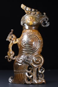 An Exquisite White Jade Beast-Face Pattern Phoenix-Shaped Ewer