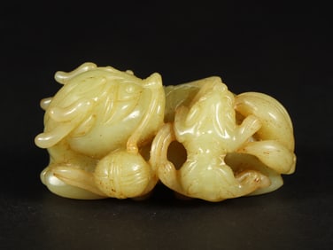 An Exquisite Yellow Jade Auspicious Beast Ornament